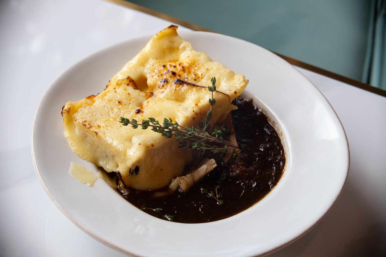 Captain's Crock — French onion soup with melted gruyère at Solera